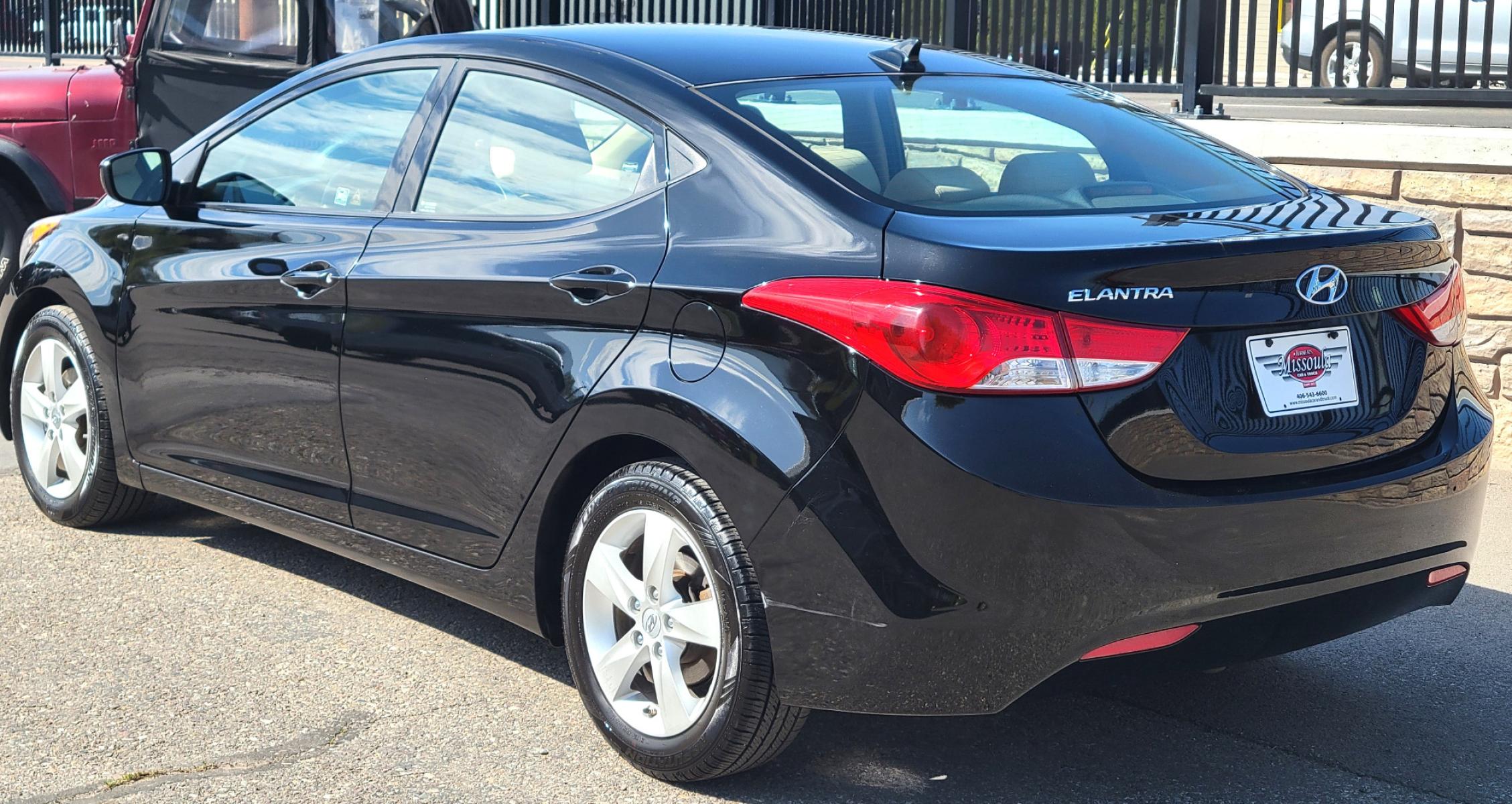 2013 Black /Tan Hyundai Elantra GLS (KMHDH4AE8DU) with an 1.8L I4 engine, 6 Speed Auto transmission, located at 450 N Russell, Missoula, MT, 59801, (406) 543-6600, 46.874496, -114.017433 - Low Mile Front Wheel Drive Sedan. One Owner. Excellent Fuel Economy. 1.8L I4 Engine. 6 Speed Automatic Transmission. AirConditioning. Power Windows and Locks. Bluetooth. - Photo #7